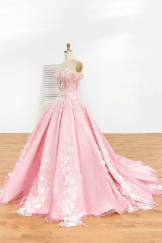 white pearls feathers flowers pink gown