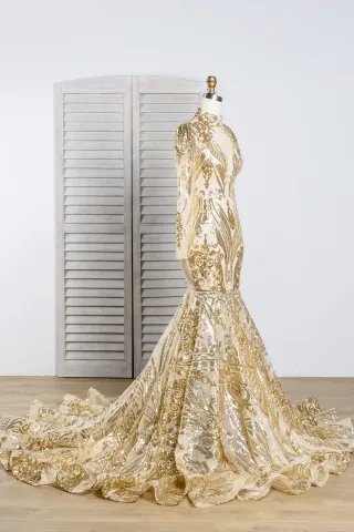 long sleeve turtle neck and plunging cut out gold sequin prom dress