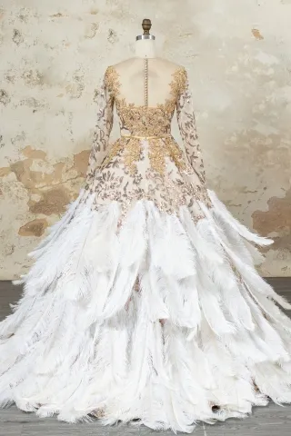 gold beaded sequin lace metallic fabric with oversized ostrich hair ball gown