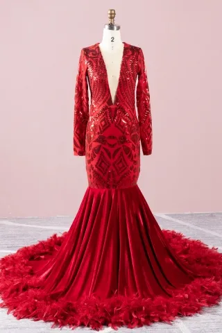 gorgeous sequin long sleeve and feather train prom dress