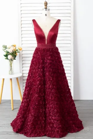 plunging v neck beaded burgundy 3d rosette prom dress