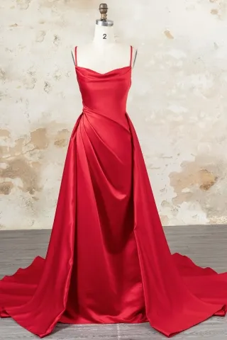 red satin cowl neck draped prom dress with overskirt