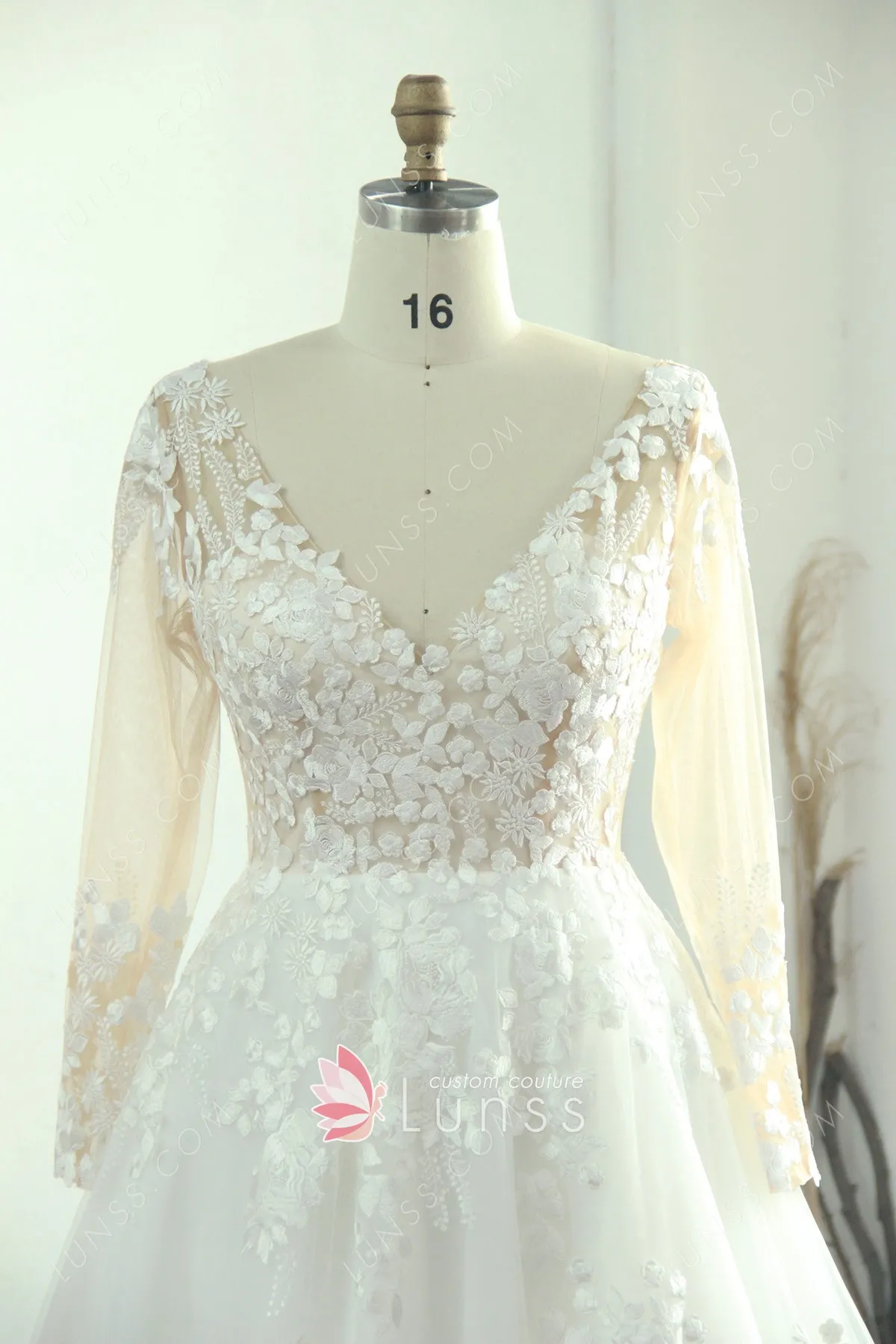 long sleeves sheer bodice lace and tulle bridal gown long sleeves sheer bodice lace and tulle bridal gown