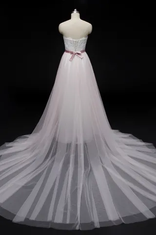 ivory and pink strapless wedding dress with chapel train