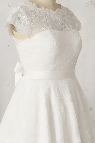 ivory illusion neck cap sleeve scalloped lace bridal gown