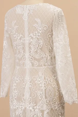 illusion sheer lace and tulle bridal dress with closed bac and long sleeves