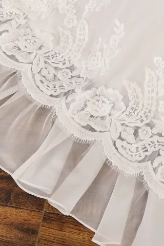 ruffled train wedding dress