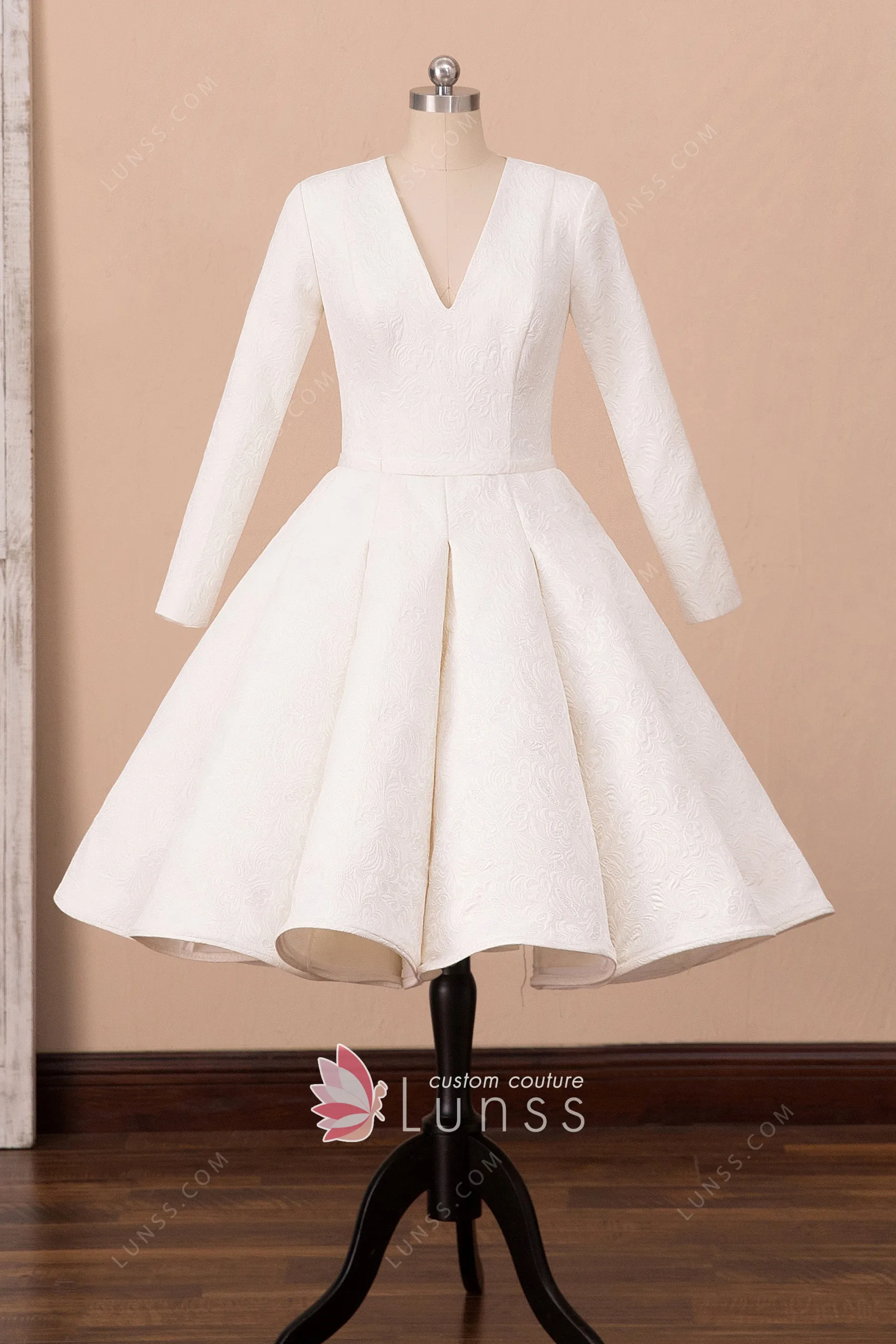 ivory tea length dress with sleeves