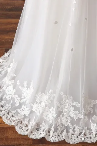 dainty lace appliqued wedding dress
