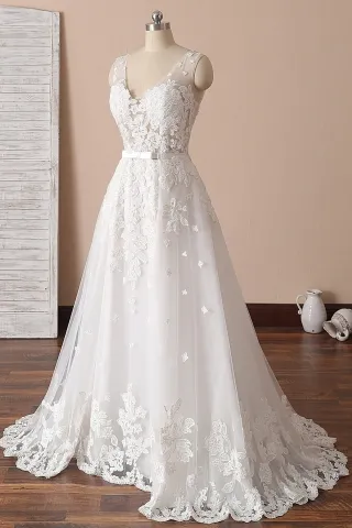 ivory lace sheer V neck mermaid wedding gown with detachable overskirt