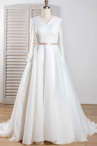 elegant long sleeve ivory lace and organza wedding dress