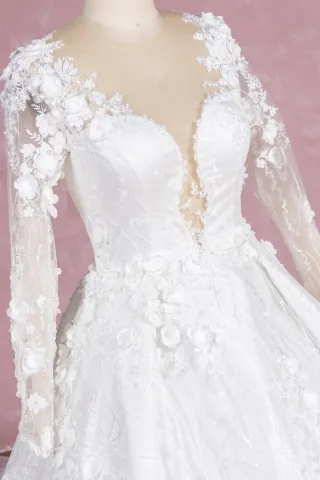 illusion cut out bodice and long sleeves with massive 3d flowers