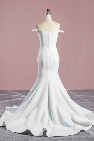 minimalist elegant ivory satin body hugging mermaid wedding gown
