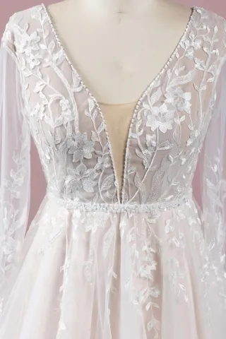 gorgeous white and nude boho wedding dress features