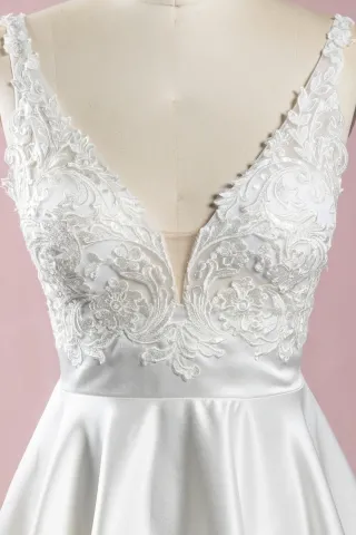 ivory lace deep V neckline