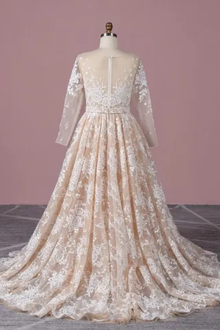 white lace appliqued illusion back nude long sleeve wedding dress