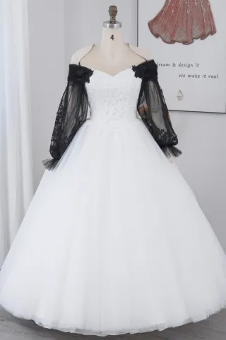 unique black tulle sleeve and white lace wedding gown