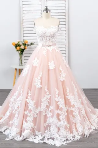romantic ivory lace appliqued blush tulle wedding gown