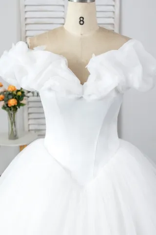 off the shoulder neckline with charming ruffled cap sleeves