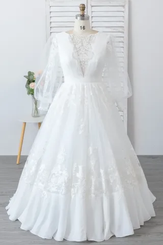 ruffled hemline illusion v neck long sleeve wedding gown