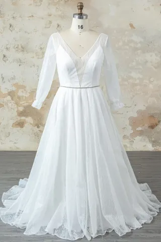 illusion plunging neck long sleeve glitter wedding dress