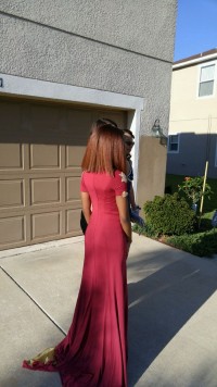 burgundy long fit and flare jersey prom dress with two slits