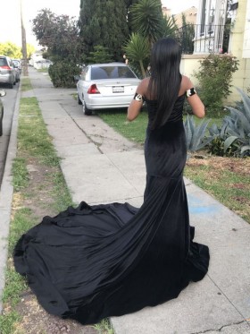 gold black prom gown with long train