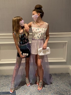 white and black cousin party rompers with detachable overskirt