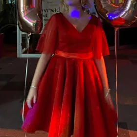 tailored red glittery birthday dress